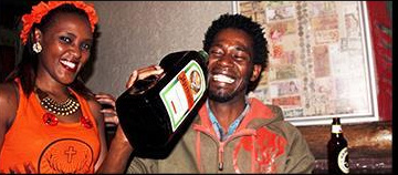 A guest celebrating with a Jägermeister bottle